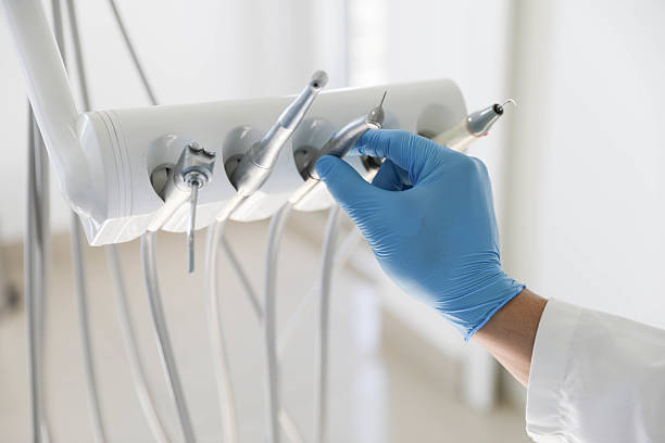 Professional Tooth Extraction technician working in Elgin, OK
